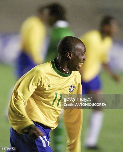 Edilson of Brazil, celebrates his goal against Bolivia, 07 November 2001, during the qualifying game for the World Cup FIFA 2002 in Korea, Japan....