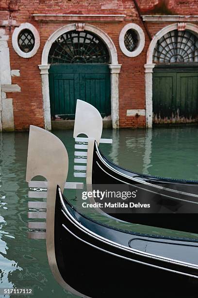 traditional gondola boats in venice, italy. - venizia stock pictures, royalty-free photos & images