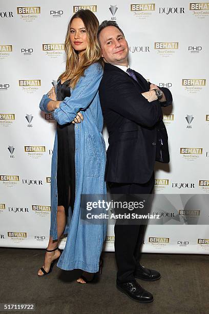 Model and designer Behati Prinsloo poses with DuJour's Jason Binn as he hosts the launch of Behati X Juicy Couture at PHD at Dream Downtown on March...