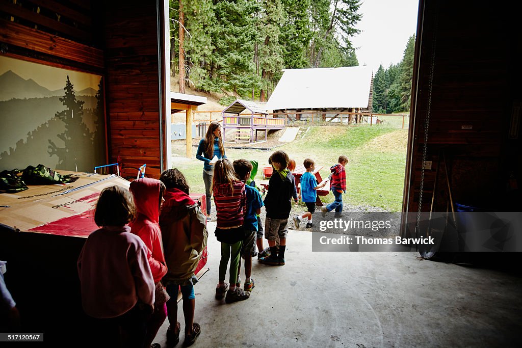 Summer camp students in line to go outside