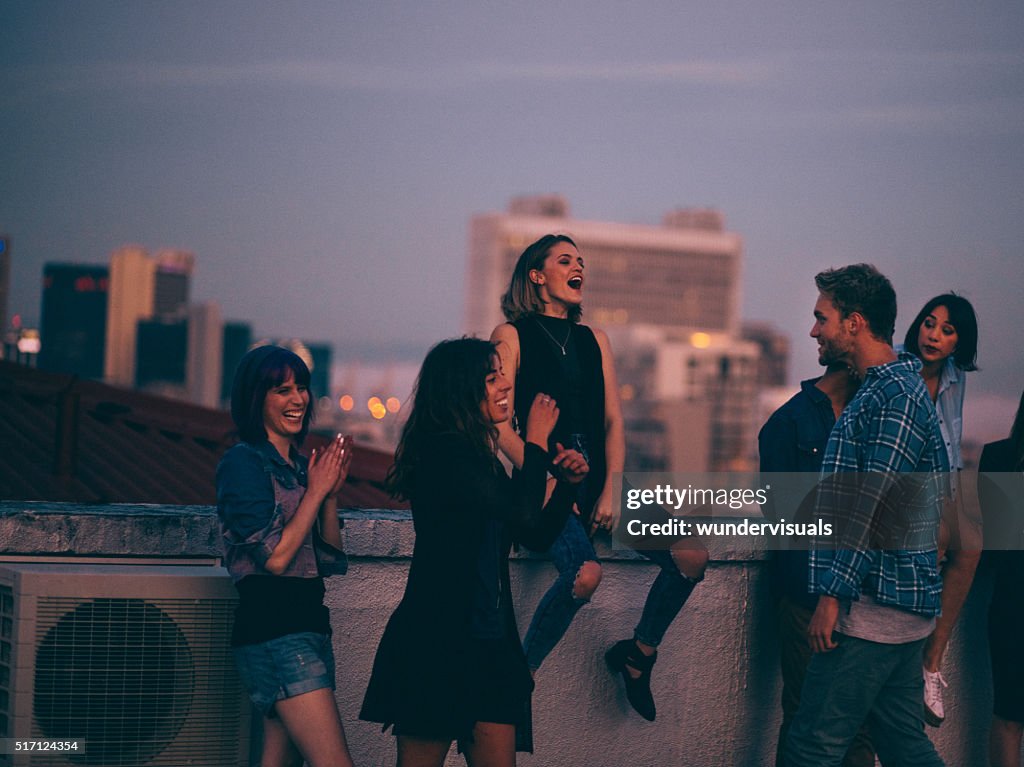 Teens celebrating a funny rooftop party