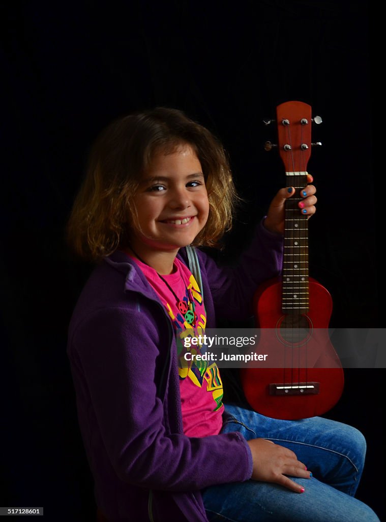 Young girl with guitar