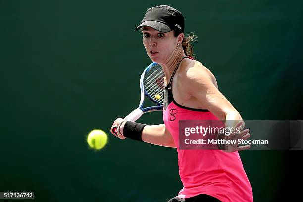 Galina Voskoboeva of Kazakhstan returns a shot to Alize Cornet of France during the Miami Open presented by Itau at Crandon Park Tennis Center on...