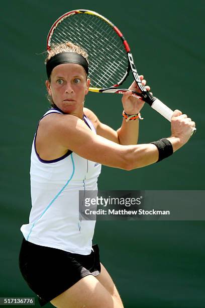 Lourdes Dominguez Lino of Spain returns a shot to Vania King during the Miami Open presented by Itau at Crandon Park Tennis Center on March 23, 2016...