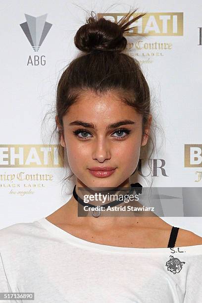 Model Taylor Hill attends as DuJour's Jason Binn hosts the launch of Behati X Juicy Couture at PHD at Dream Downtown on March 23, 2016 in New York...