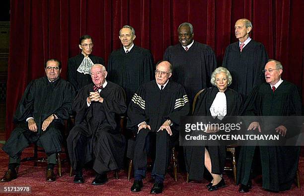 This 05 December, 2003 shows the justices of the US Supreme Court, posing for an official photo at the Supreme Court in Washigton DC. L-R seated...