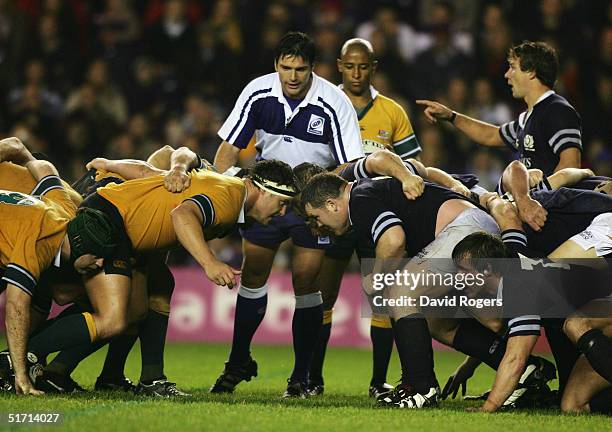Referee Steve Walsh of New Zealand officiates at a scrummage during the Rugby Union International match between Scotland and Australia at Murrayfield...