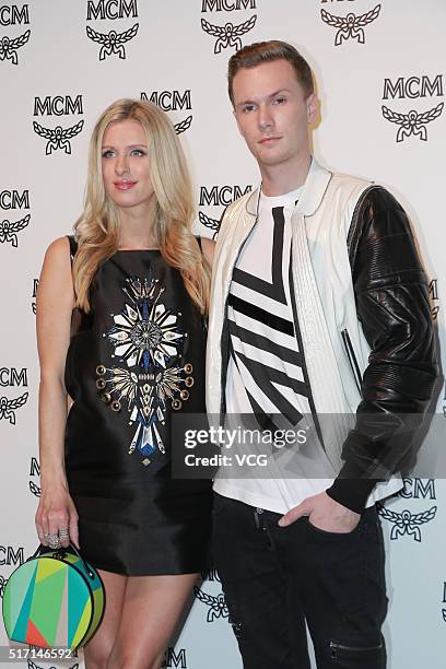 Model Nicky Hilton and her younger brother Conrad Hughes Hilton III attend a party of MCM Flagship Store on March 23, 2016 in Hong Kong, China.