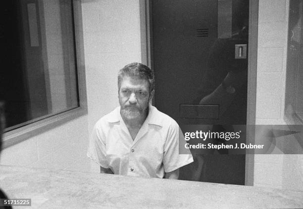 American domestic terrorist, luddite, and mathematics teacher Ted Kaczynski sits and listens during an interview in a visiting room at the Federal...