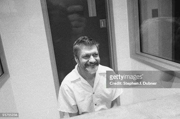 American domestic terrorist, luddite, and mathematics teacher Ted Kaczynski sits and smiles during an interview in a visiting room at the Federal ADX...