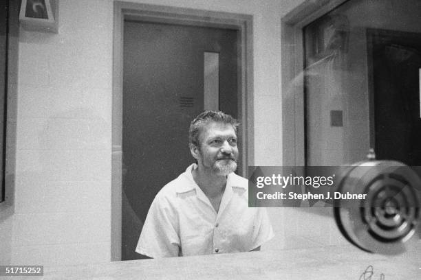 American domestic terrorist, luddite, and mathematics teacher Ted Kaczynski sits and smiles during an interview in a visiting room at the Federal ADX...