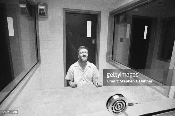 American domestic terrorist, luddite, and mathematics teacher Ted Kaczynski smiles as he poses during an interview in a visiting room at the Federal...