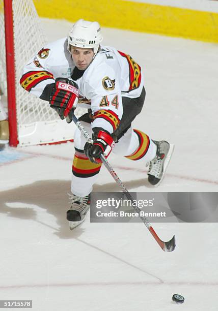 Jesse Fibiger of the Binghamton Senators makes an outlet pass against the Bridgeport Sound Tigers during the American Hockey League game at Arena at...