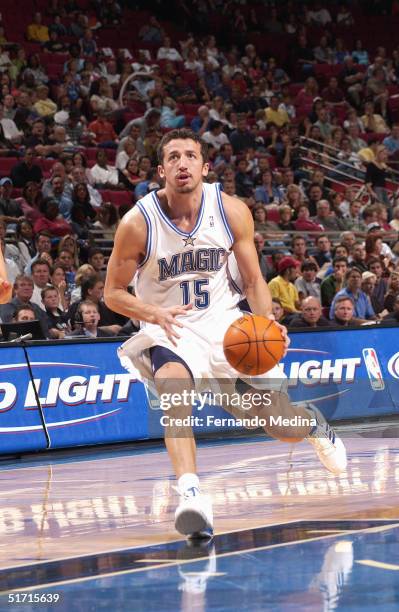 Hedo Turkoglu of the Orlando Magic drives during the preseason game against the Houston Rockets at TD Waterhouse Centre on October 23, 2003 in...