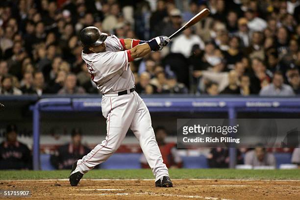 Manny Ramirez of the Boston Red Sox bats during game one of the ALCS against the New York Yankees at Yankee Stadium on October 12, 2004 in the Bronx,...