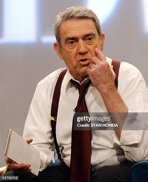 Anchor Dan Rather speaks at news conference on the discovery of anthrax at CBS studios 18 October 2001, in New York. An employee of CBS was found to...