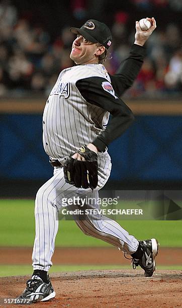 Curt Schilling of the Arizona Diamondbacks pitches to the Atlanta Braves in the sixth inning 19 October 2001 during game three of the National League...