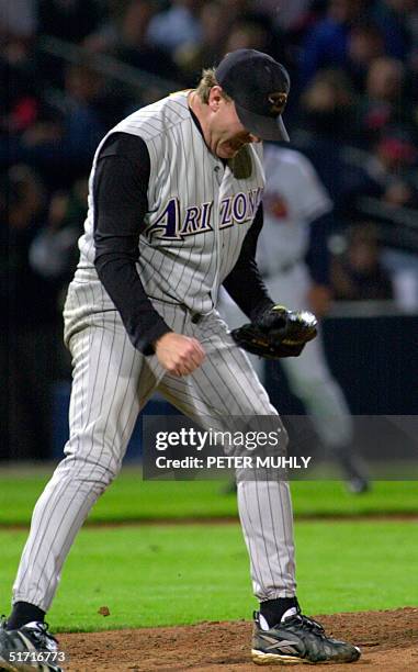 Curt Schilling of the Arizona Diamondbacks reacts after winning game 3 of the National League Championship Series against the Atlanta Braves 19...