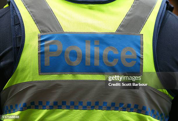 Detail of the Police badge on a police officers protective vest during a memorial service to honour Constable Angela Taylor on March 24, 2016 in...