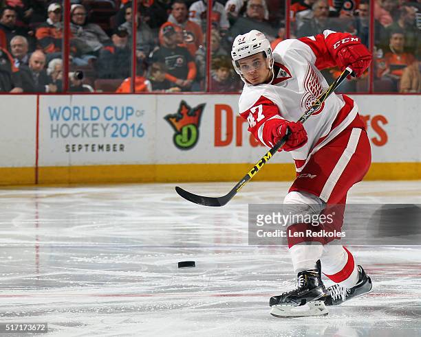 Alexey Marchenko of the Detroit Red Wings shoots the puck against the Philadelphia Flyers on March 15, 2016 at the Wells Fargo Center in...
