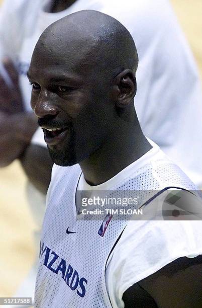 Michael Jordan leaves the court after his first practice on opening day of the Washington Wizards training camp 02 October, 2001 at the University of...