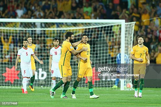 Mile Jedinak of Australia congratulates team mate Massimo Luongo of Australia after scoring a goal during the 2018 FIFA World Cup Qualification match...