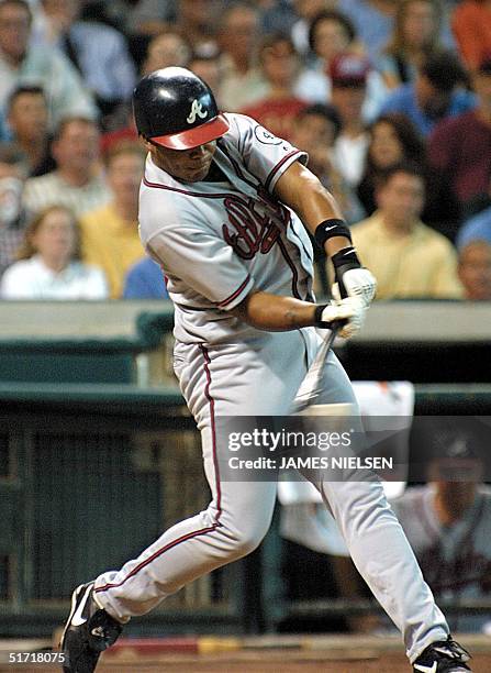 Atlanta Braves' Andruw Jones hits a single off the Houston Astros Dave Mlicki in the second inning of game two of the National League Divison Series...