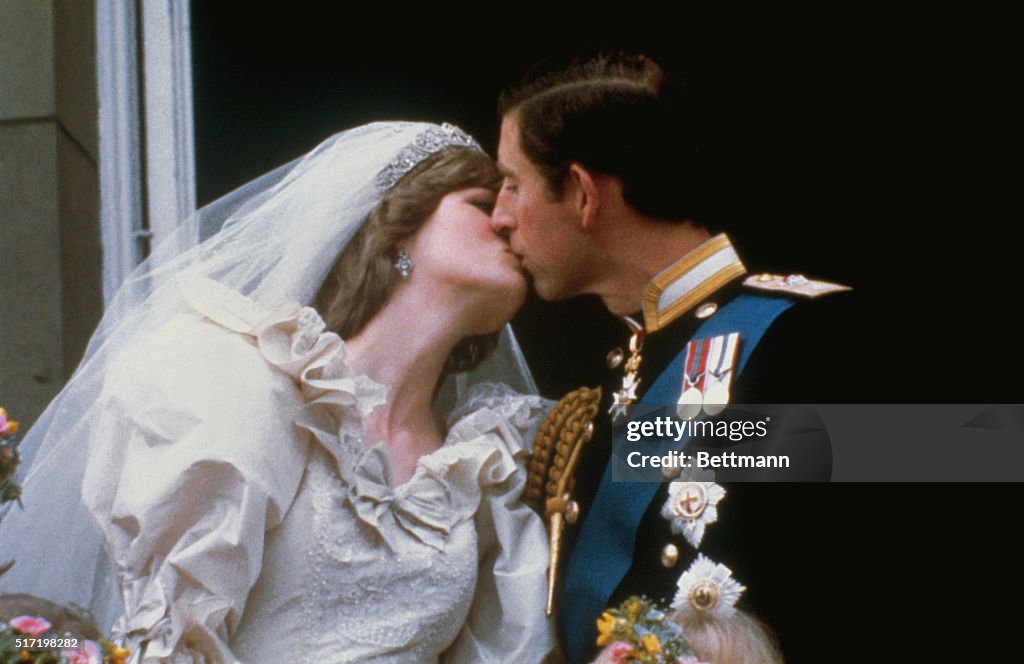 Charles Kissing Diana
