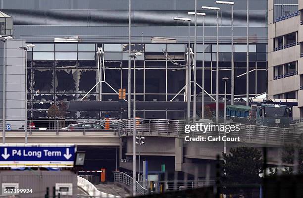 The bomb-damaged departure hall area of Brussels airport is pictured on March 24, 2016 in Brussels, Belgium. Belgium is observing three days of...
