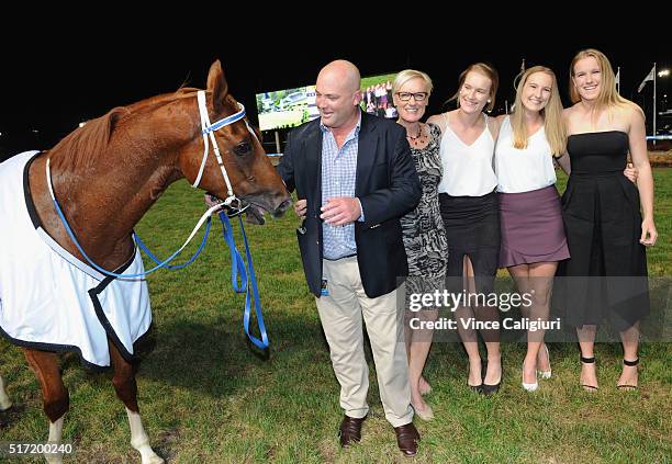 Trainer Peter Moody and his wife Sarah Moody pose with Flamberge after winning Race 6, the Mitchelton Wines William Reid Stakes during Melbourne...