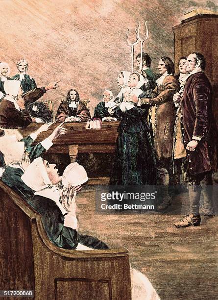 Salem Witch Trial. Accusation of bedeviled girl. After an engraving by Howard Pyle.