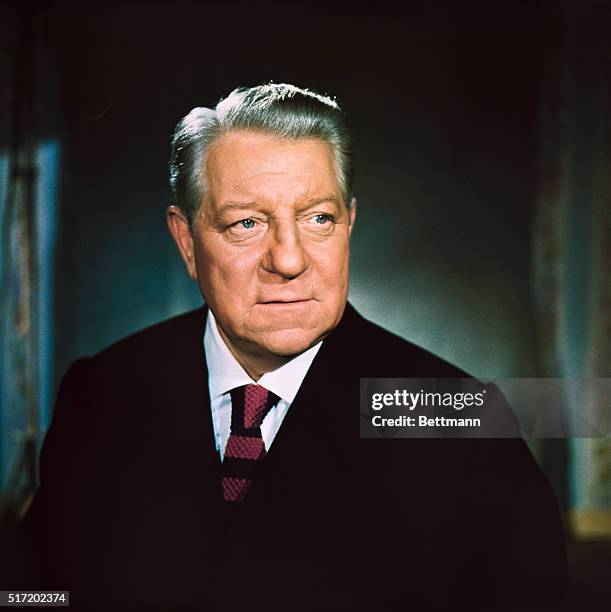 Publicity handout of French born actor Jean Gabin . Head and shoulders shot of Gabin wearing a suit and tie.