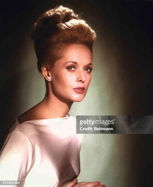 Tippi Hedren, who plays the title role in Alfred Hitchcock's Marnie, sex mystery in which she stars with Sean Connery, a Universal release, in...