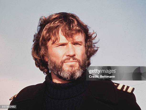 Kris Kristofferson wearing a turtle-neck sweater.