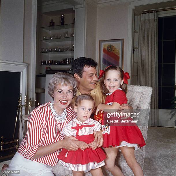 Tony Curtis and Janet Leigh with their two daughters, Jamie Lee and Kelly Lee.