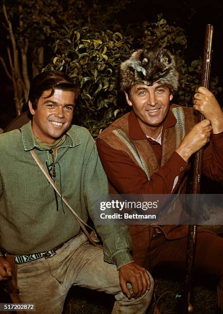 Publicity handout form the 1960s television Western, Daniel Boone. In costume, Fess Parker , in the title role, and Darby Hinton, as Israel Boone,...