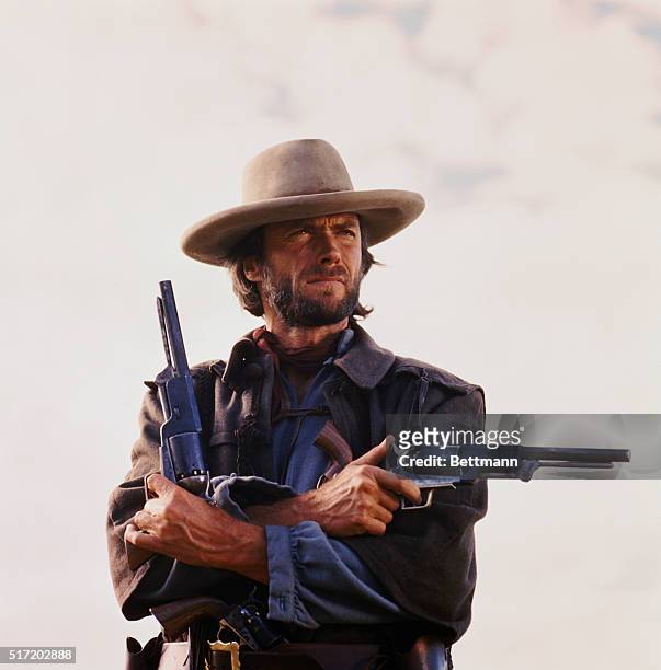 Movie still of Clint Eastwood starring in the 1976 Western The Outlaw Josey Wales, directed by Clint Eastwood himself. Photo shows him from the...