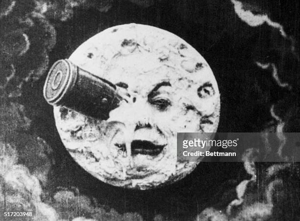 Depiction of Man in the Moon with a rocket in his eye from the 1914 silent animated film A Trip to the Moon directed by George Melies.