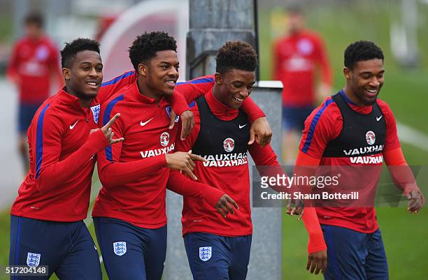 Rolando Aarons , Chuba Akpom, Demarai Gray and Jordon Ibe joke during an England U21 training session ahead of their UEFA U21 European Championship...