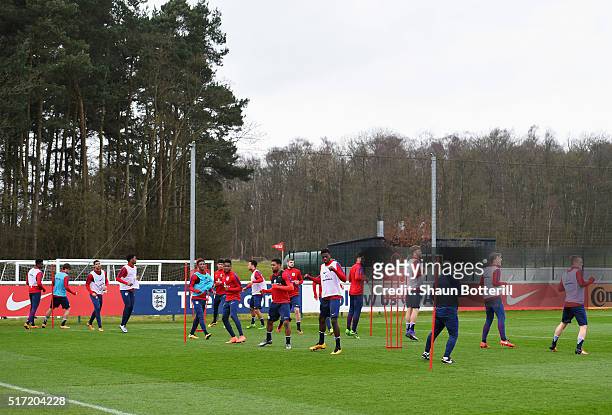 Players warm up during an England U21 training session ahead of their UEFA U21 European Championship qualifier against Switzerland at St Georges Park...