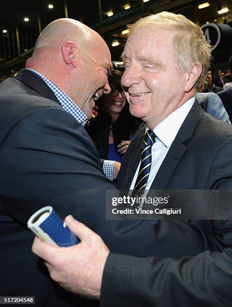 Trainer Peter Moody is congratulated by owner David Moodie after Flamberge won Race 6, the Mitchelton Wines William Reid Stakes during Melbourne...