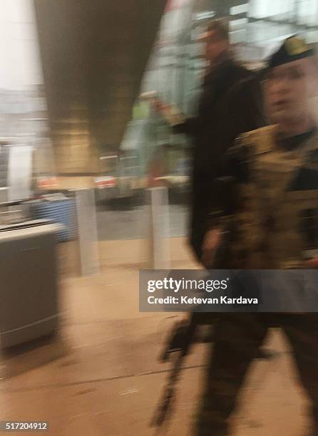 Armed miltary attend the scene following a suicide bombing at Brussels Zaventem airport on March 22, 2016 in Brussels, Belgium. Georgian journalist...