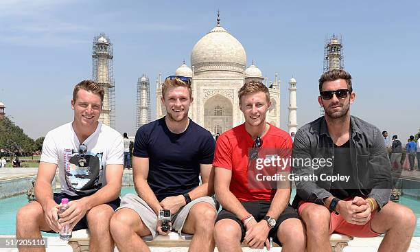 Jos Buttler, David Willey, Joe Root and Liam Plunkett of England pose for a portrait during a visit to the Taj Mahal on March 24, 2016 in Agra, India.