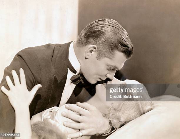 Clark Gable embracing Carole Lombard in No Man of Her Own.