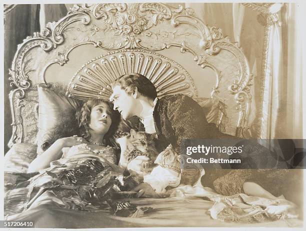 Actors John Barrymore and Dolores Costello during a scene from the 1927 silent film When a Man Loves, directed by Alan Crosland.