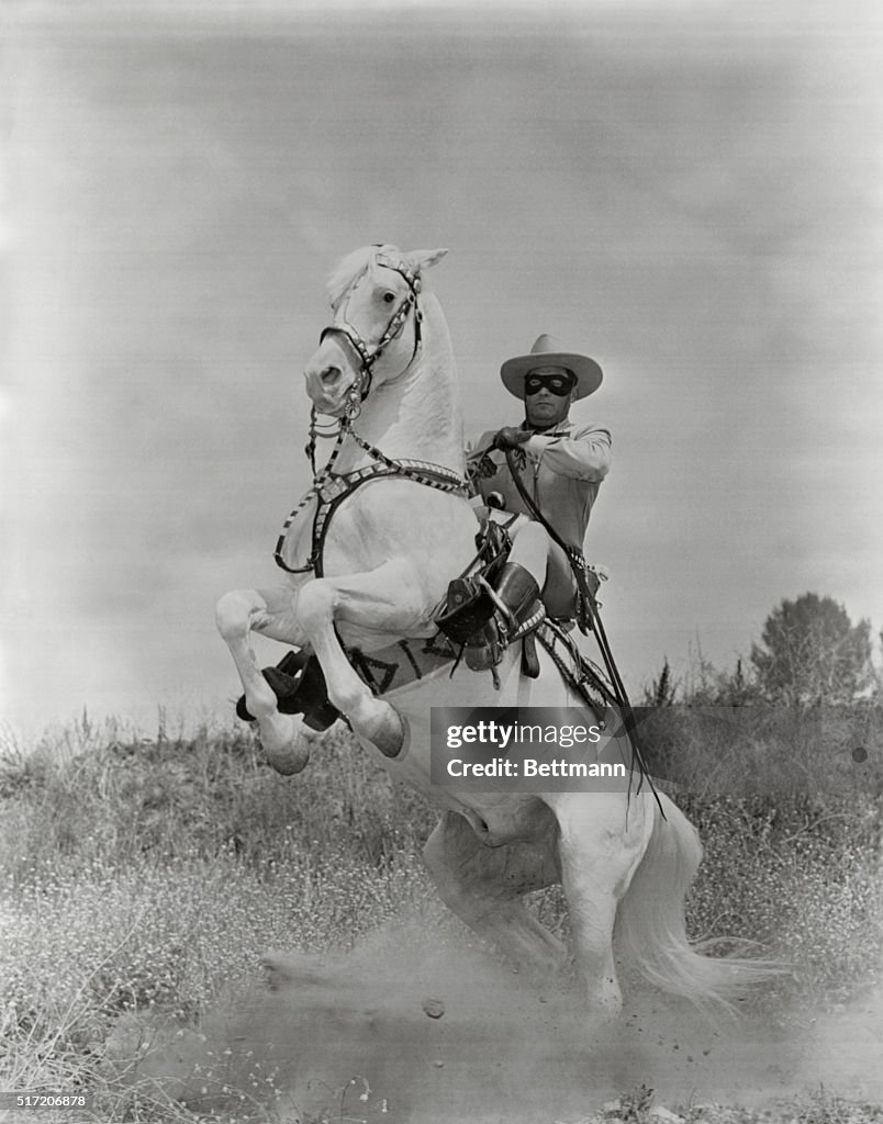 Clayton Moore as The Lone Ranger astride Silver