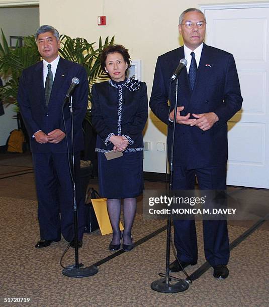 Director General of the Defense Agency of Japan Gen Nakatani, Japanese Foreign Minister Makiko Tanaka and US Secretary of State Colin Powell speaks...