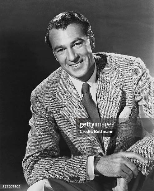 Full length portrait of the American actor Gary Cooper , who starred in many movies such as the film adaptations of Ernest Hemming's Farewell to Arms...