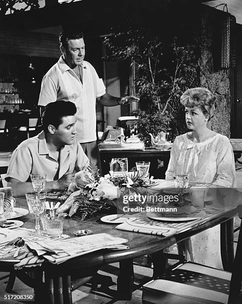 Movie still from the 1961 film Blue Hawaii, starring Elvis Presley and Angela Lansbury, who plays his mother in the picture. Photo shows the two...