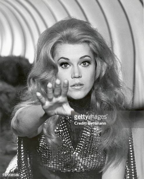 Actress Jane Fonda in a close-up with her arm outstretched in the 1968 production of "Barbarella". Undated movie still.